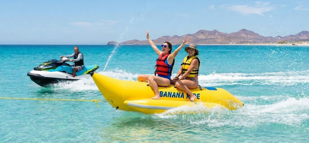 Jet ski and banana boat water sports on calm Sea of Cortez waters near Playa Encanto Rocky Point Mexico